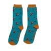 Pair of blue socks with orange-brown trim, with pheasant design.