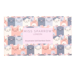 A closed box with cat on, and the words Miss Sparrow London, Brathable Soft Bamboo Socks on it. 