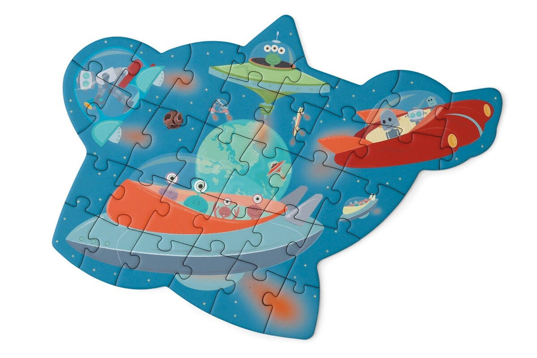 A jigsaw with an irregular shape rather being square or rectangle. The picture has space ships and flying saucers with alien characters in side them.  Planet earth is visible in the background.