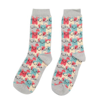 Load image into Gallery viewer, One pair of bamboo socks laid out - the socks are covered in cats of different colours -pink, creams, pale blue and pale grey. 