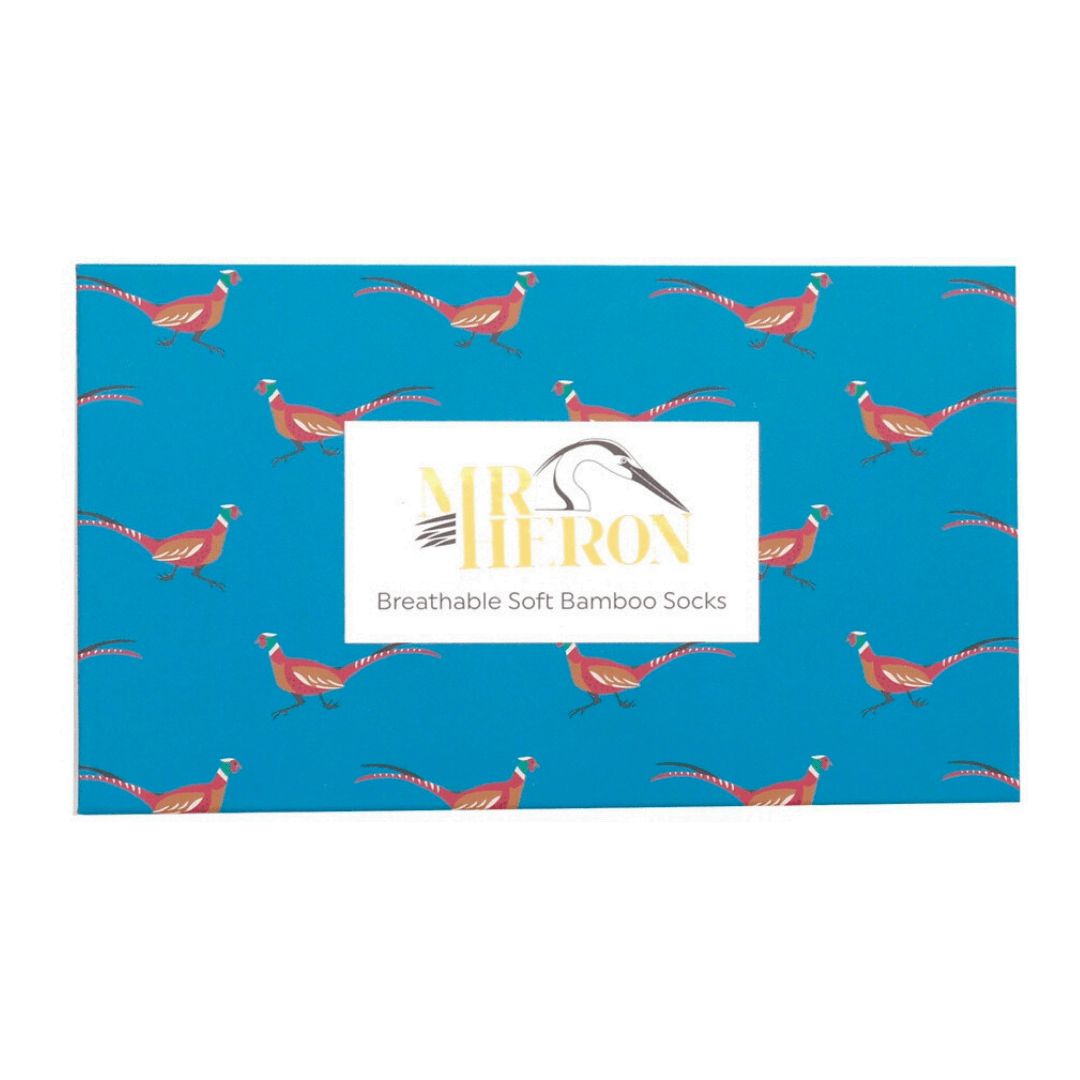 Blue box with the Mr Heron logo on it and the words Breathable Soft Bamboo Socks. The box has pheasants on it