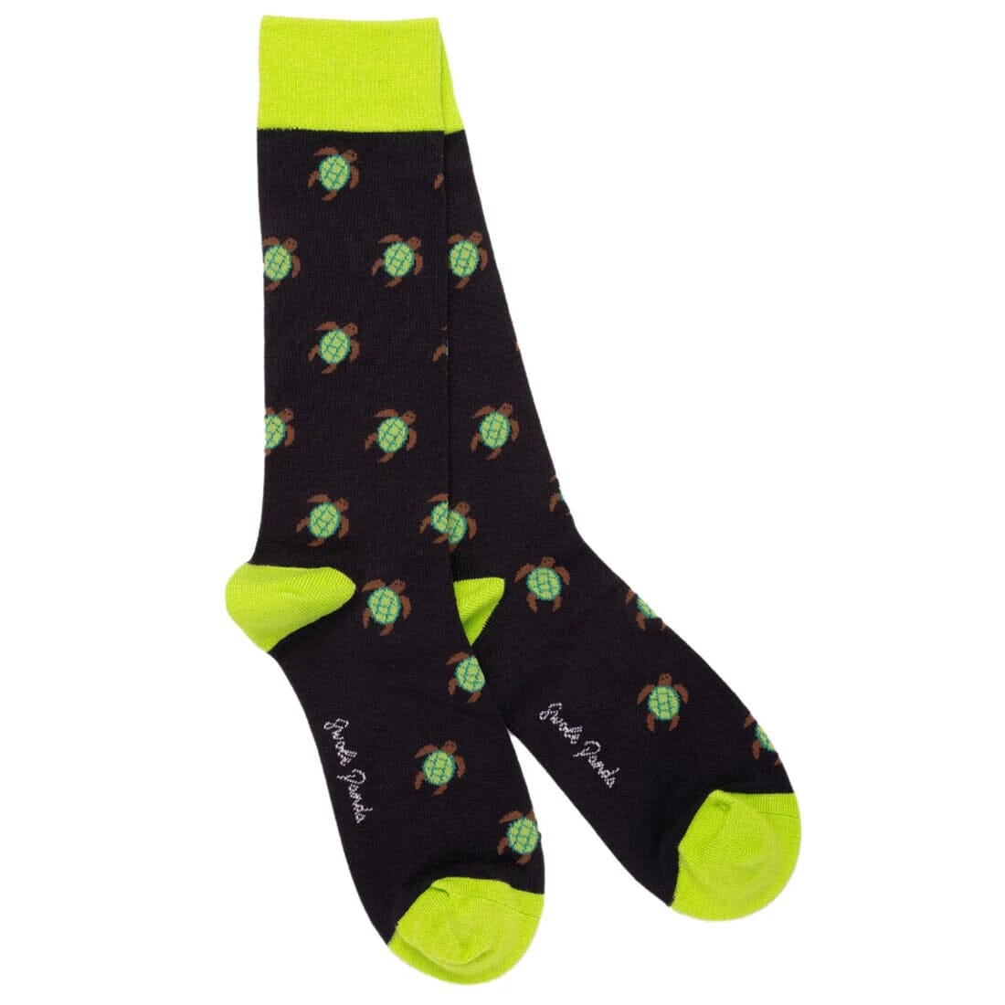 A pair of crew socks with a black background featuring a repeating pattern of green sea turtles with brown shells. The socks have bright neon yellow-green cuffs, heels, and toes, with the words Swole Panda printed in white script near the toes.