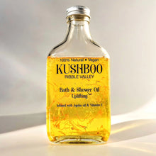 Load image into Gallery viewer, A glass bottle of Kushboo bath and shower oil,