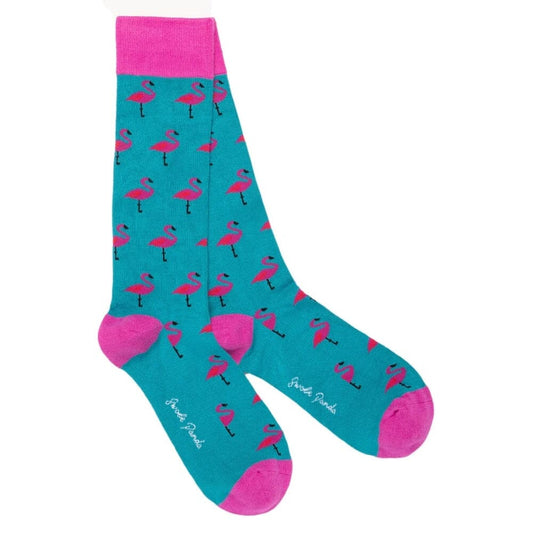 Teal sock with pink accents and flamingo pattern 