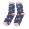 Pair of dark blue ladies bamboo socks with dainty floral design and pink trim 