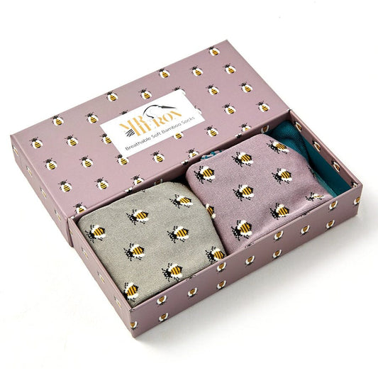 2 pairs of mens Mr Heron bamboo socks in a box. The box ha honey bees on it, and the lid is open so you can see the two Pais of socks inside. 