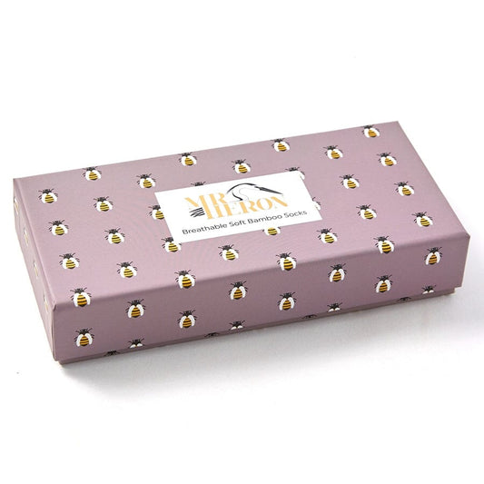 Box of mens Mr Heron Bamboo Socks with honey bee design. The box is closed, and has honey bees on it. 